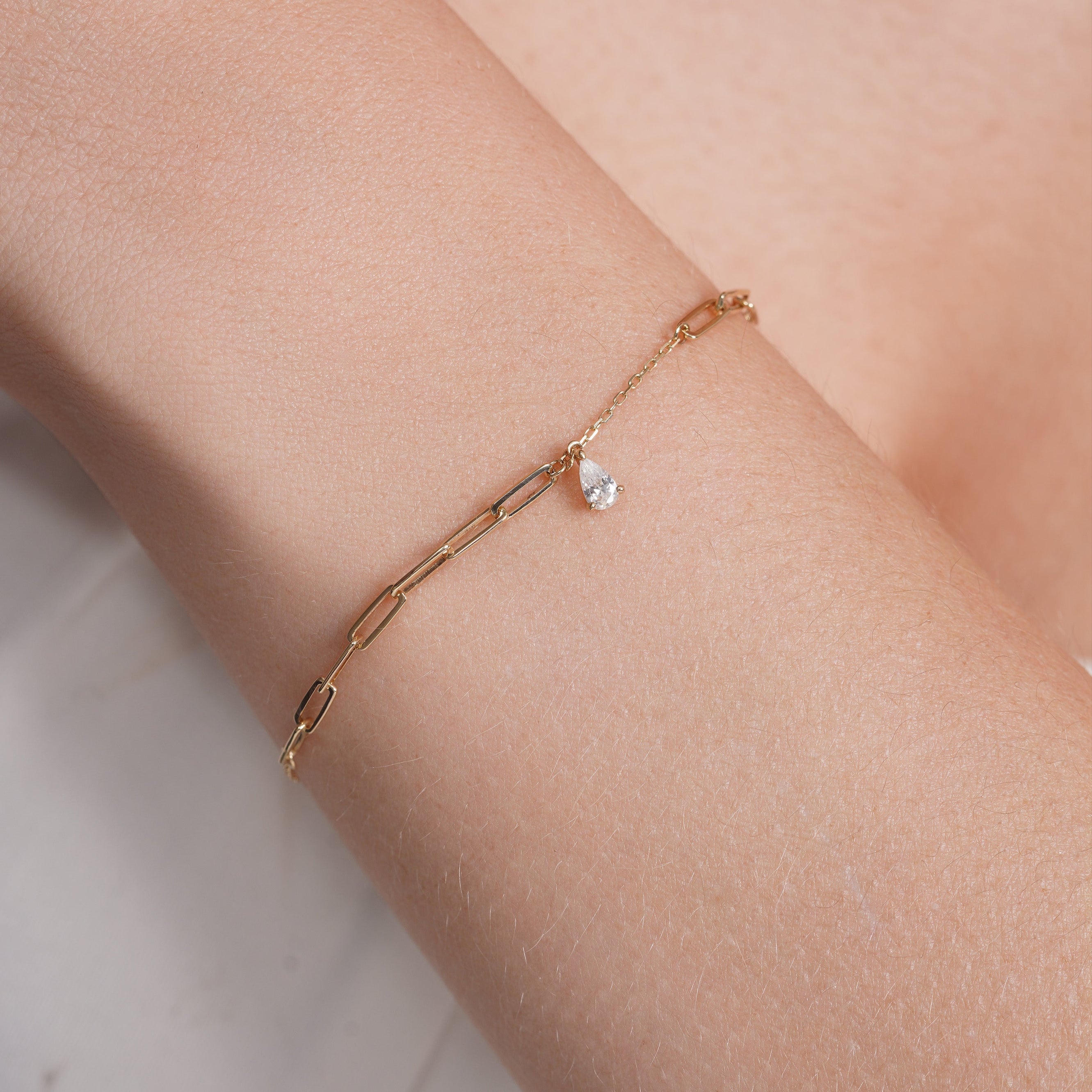 14KB0007. - 14 Karat Yellow Gold Teardrop CZ Charm Paperclip Adjustable Bracelet