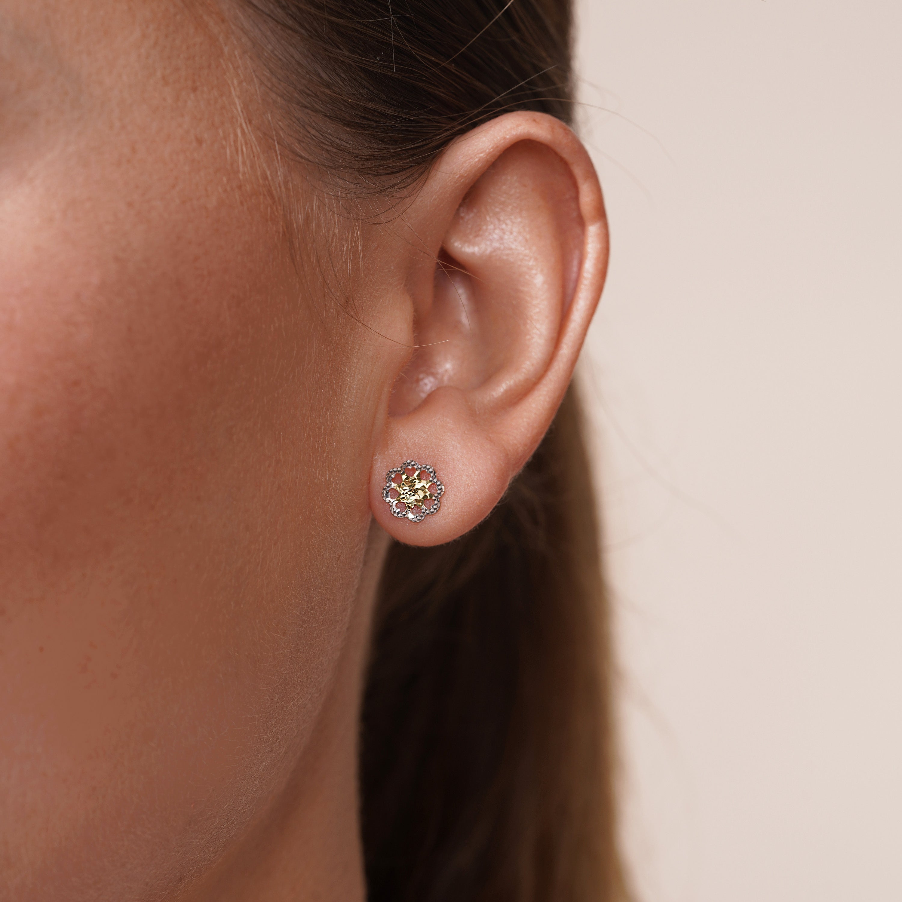 14KE0002. - 14 Karat Yellow & White Gold Diamond Cut Flower Earrings