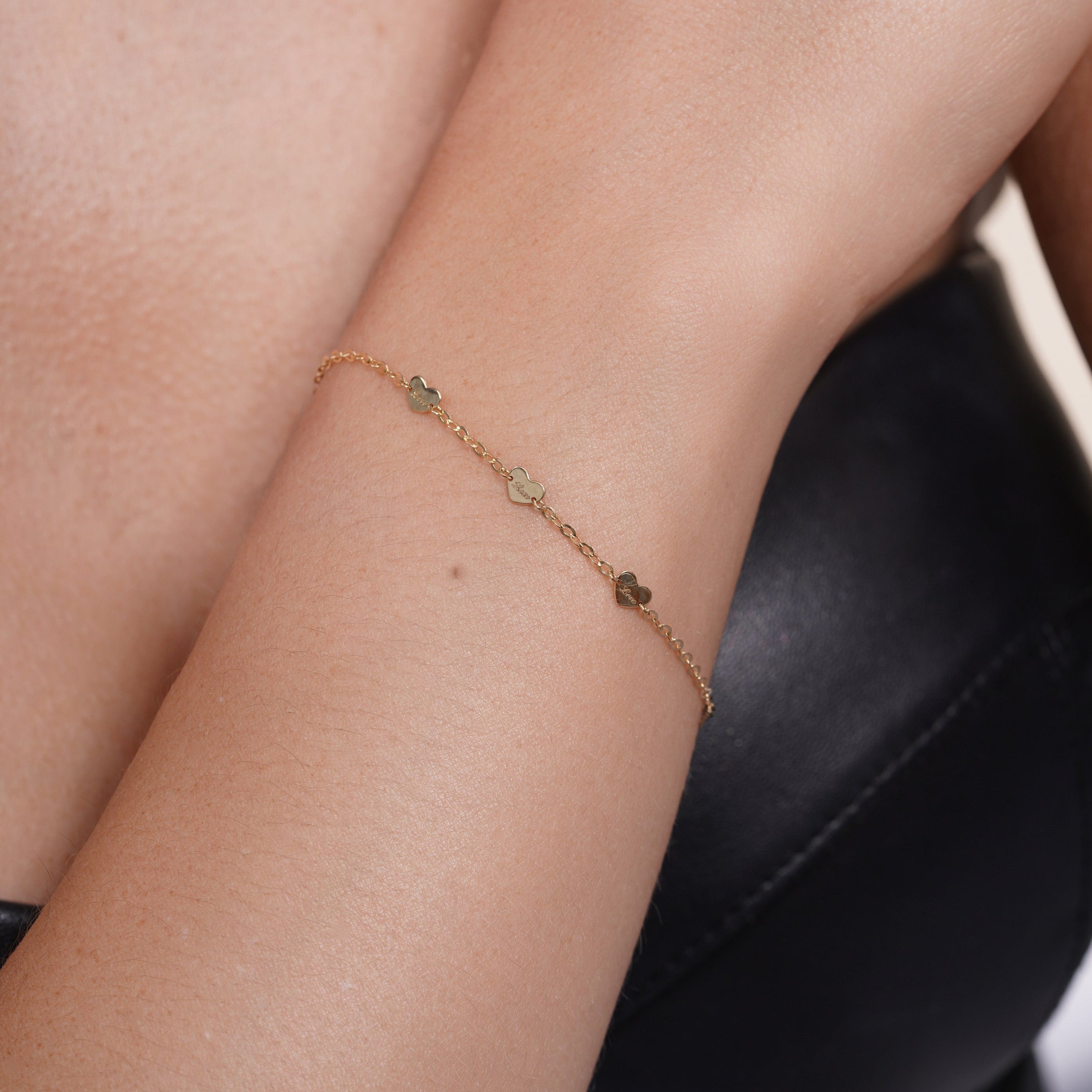 14KB0006. - 14 Karat Yellow Gold Heart Engraved Love Charm Adjustable Bracelet