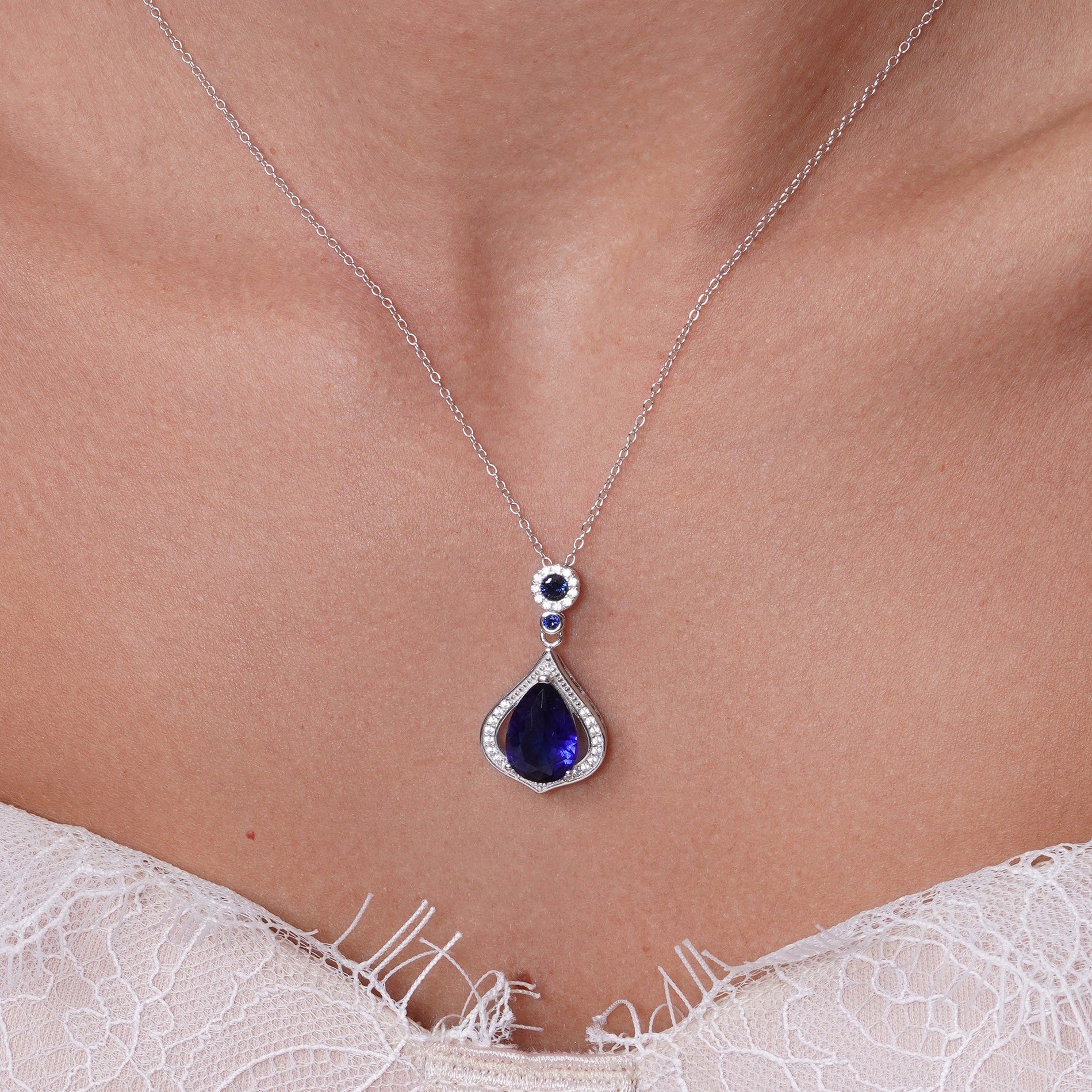 Juego de aretes colgantes y collar colgante con circonita cúbica en forma de lágrima transparente y azul bañada en rodio de plata 925 - BGS00440