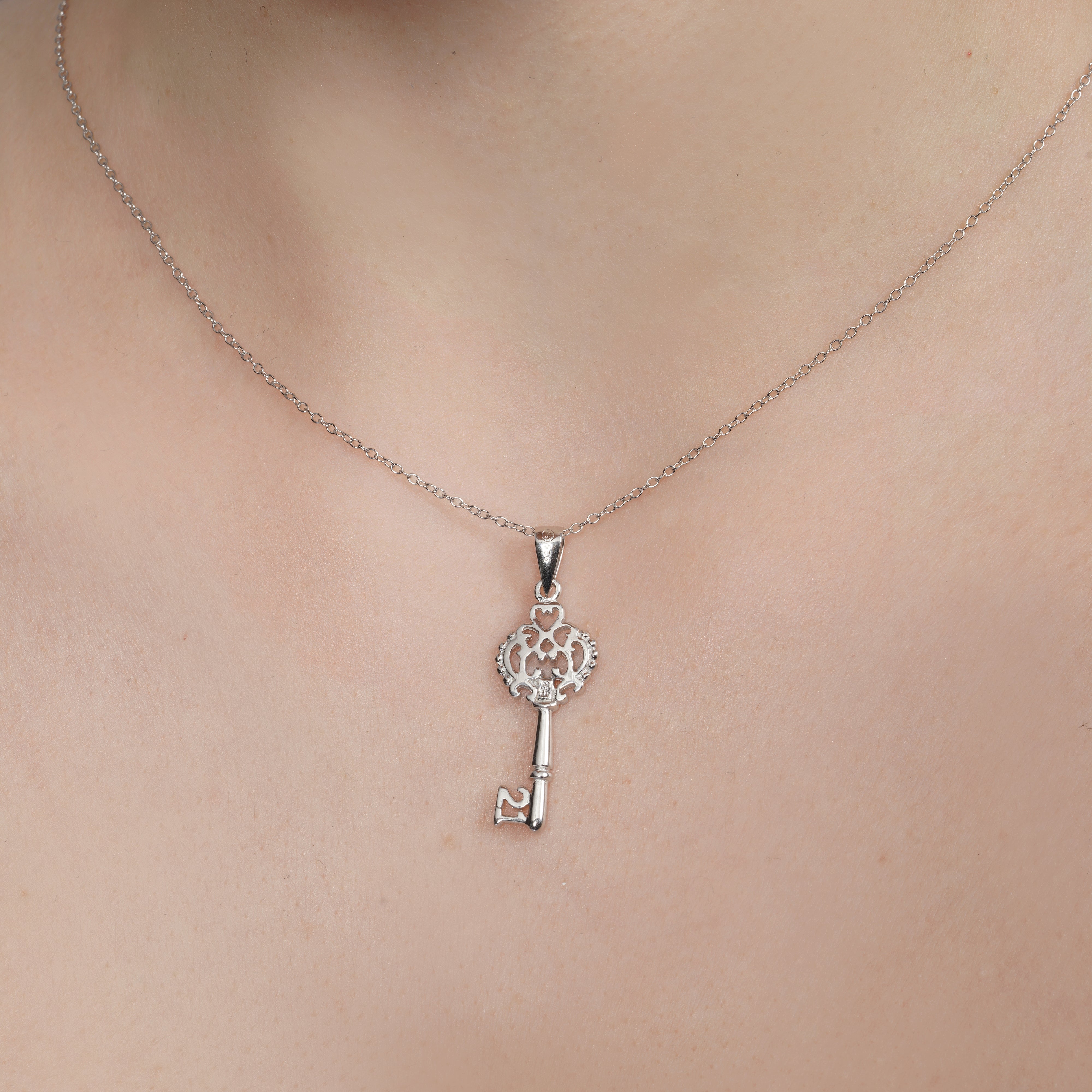 Rhodium Plated 925 Sterling Silver Open Key CZ Necklace - BGP00434