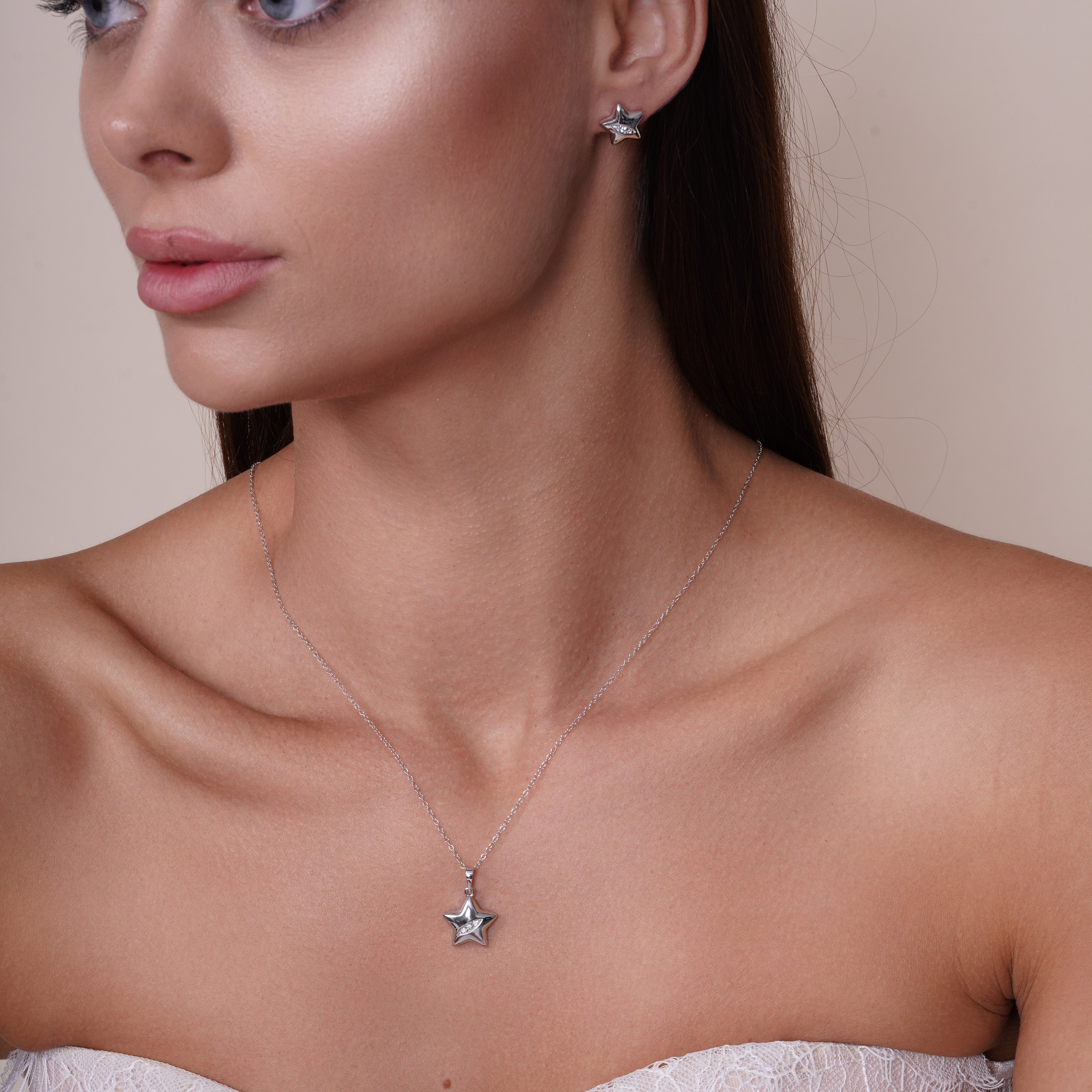 Juego de aretes y collar con circonita cúbica y estrella transparente bañada en rodio en plata 925 - BGS00436