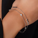 Pulsera ajustable de plata de ley 925 rodiada con dije de corazón de dos vueltas y circonita cúbica transparente con corte de diamante - GMB00163