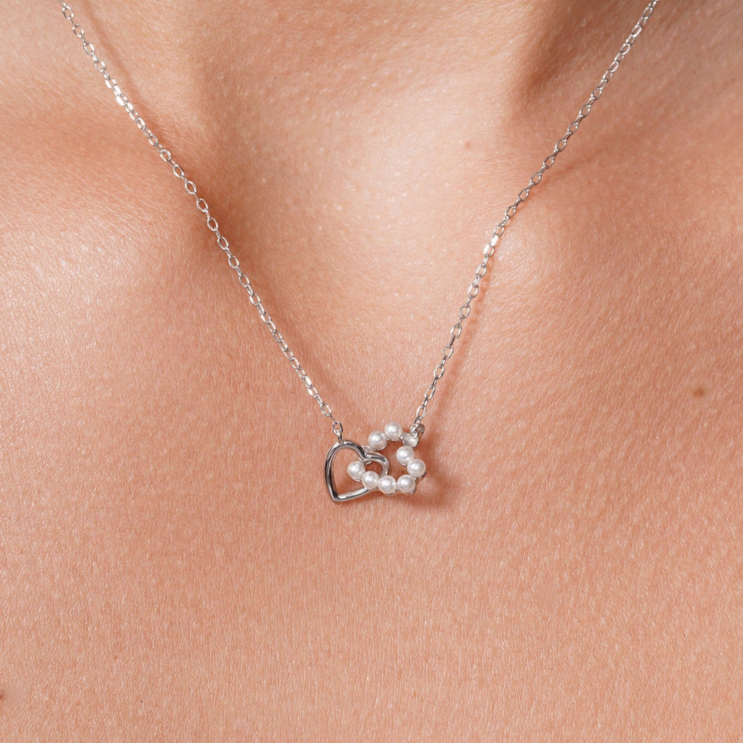 Rhodium Plated 925 Sterling Silver Intertwined Synthetic Pearl Heart Adjustable Necklace - JTN00002