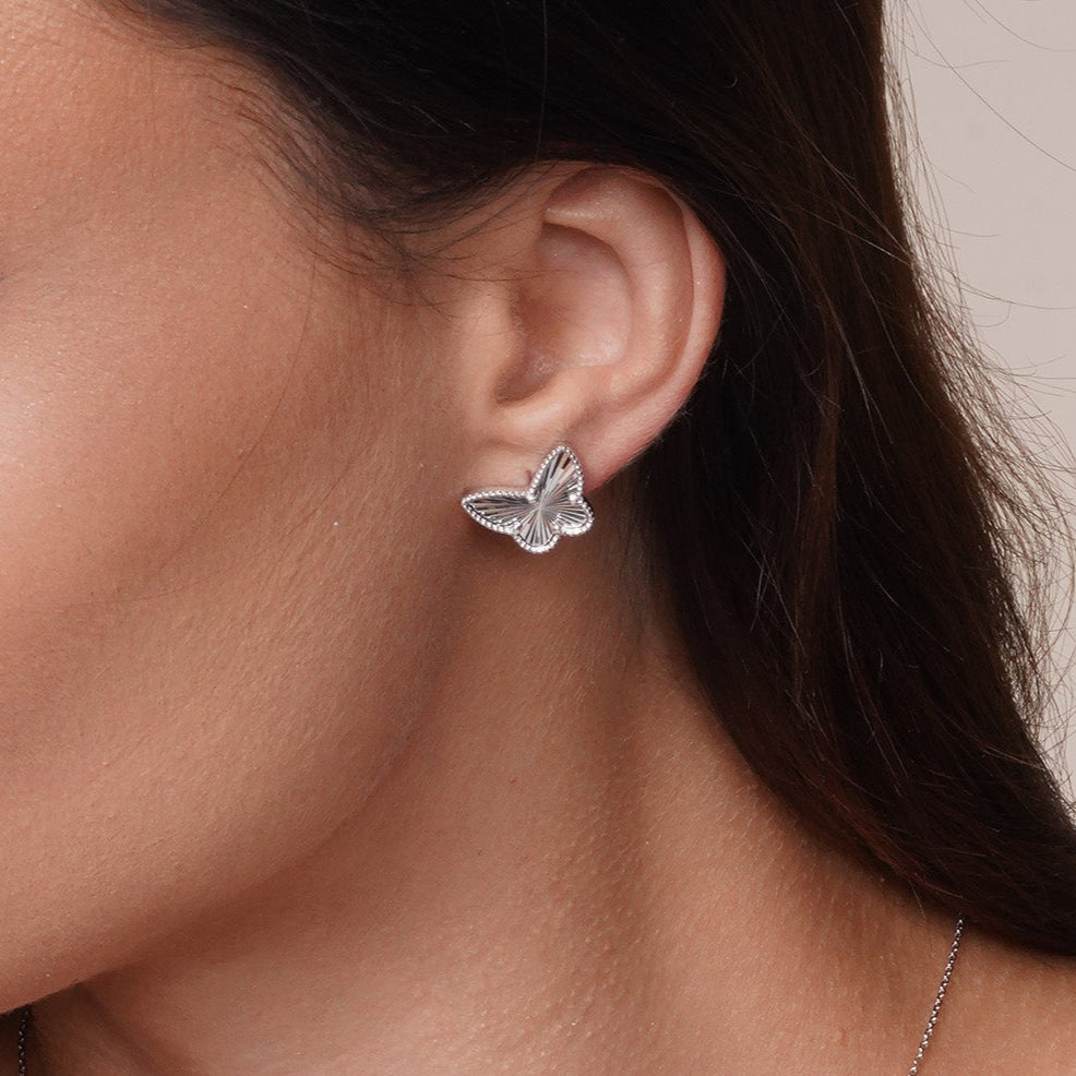 Pendiente de aro con cruz de moissanita en plata de ley 925 rodiada - MGME00037