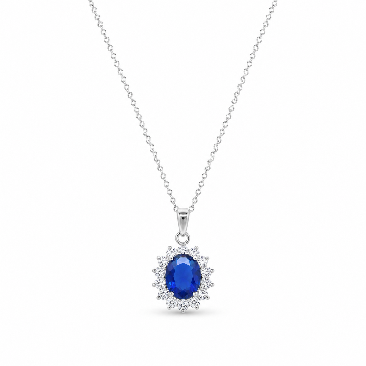 Rhodium Plated 925 Sterling Silver Blue Oval CZ Halo Pendant Necklace - STP00788