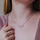 Rhodium Plated 925 Sterling Silver Open Dog Bone CZ Necklace - BGP01448