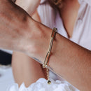 Pulsera ajustable con clip de 5,5 mm de plata de ley 925 bañada en oro - ITB00337-GP