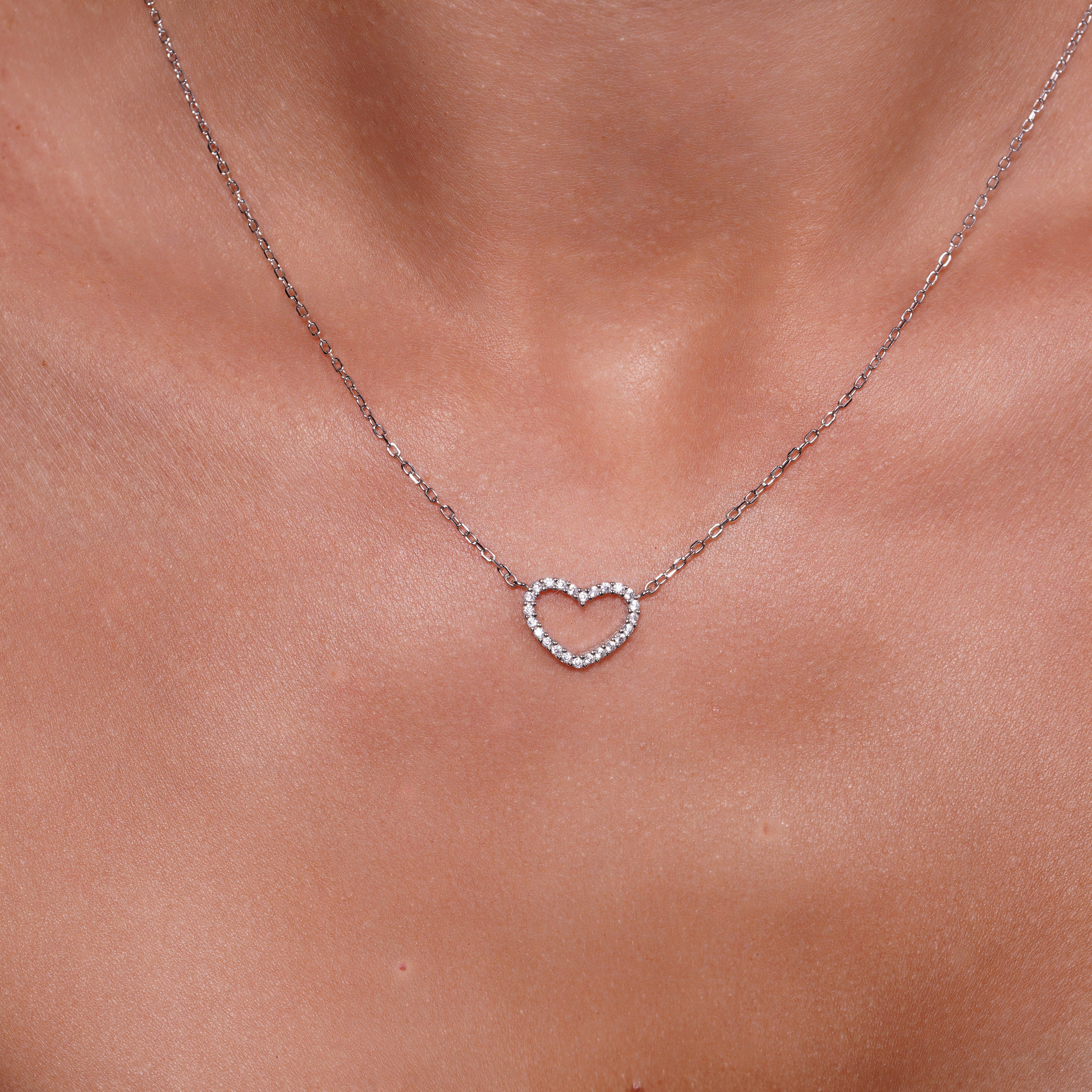 Rhodium Plated 925 Sterling Silver CZ Heart Outline Pendant - SPP00080