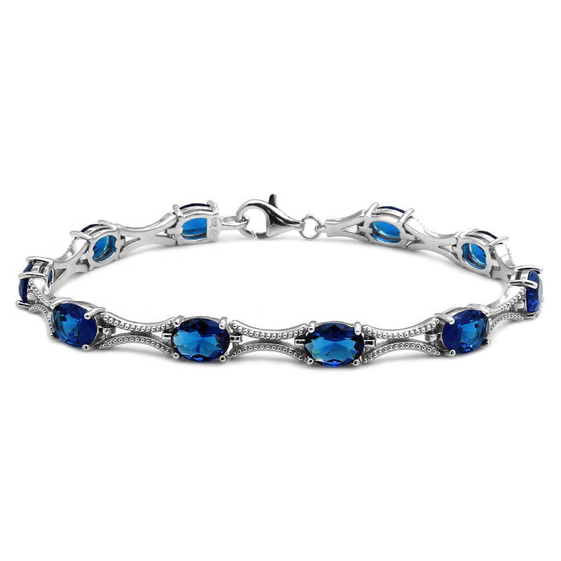 Silver 925 Rhodium Plated Blue Oval CZ Tennis Bracelet - BGB00290BLU | Silver Palace Inc.