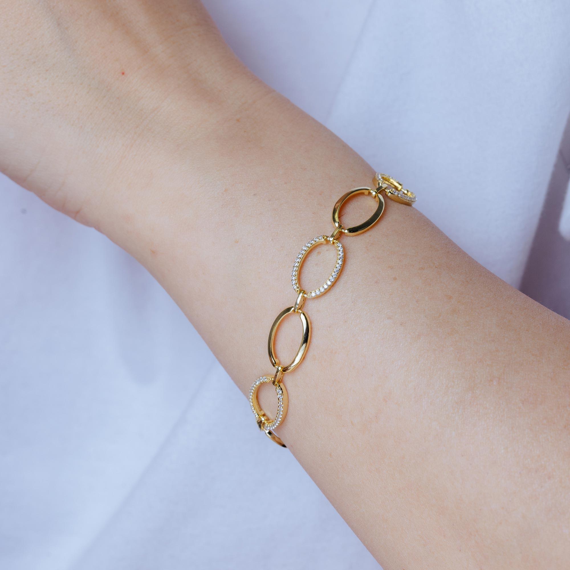 Pulsera de plata de ley 925 bañada en oro con circonitas cúbicas ovaladas - STB00580GP