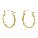 14E00385. - 14 Karat Yellow Gold Diamond Cut Textured Oval Hoop Latch Lock Earrings
