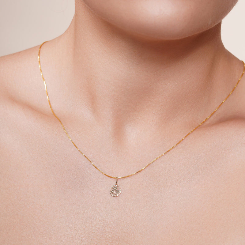 14P00149. - Colgante de oro amarillo de 14 quilates con detalle de corazón de niño sonriente