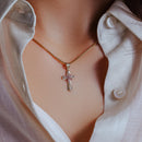 14P00071 - Colgante con cruz de oro amarillo de 14 quilates en dos tonos con circonita transparente