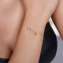 14KB0005. - 14 Karat Yellow Gold Diamond Cut Four Leaf Clover Charms Adjustable Bracelet