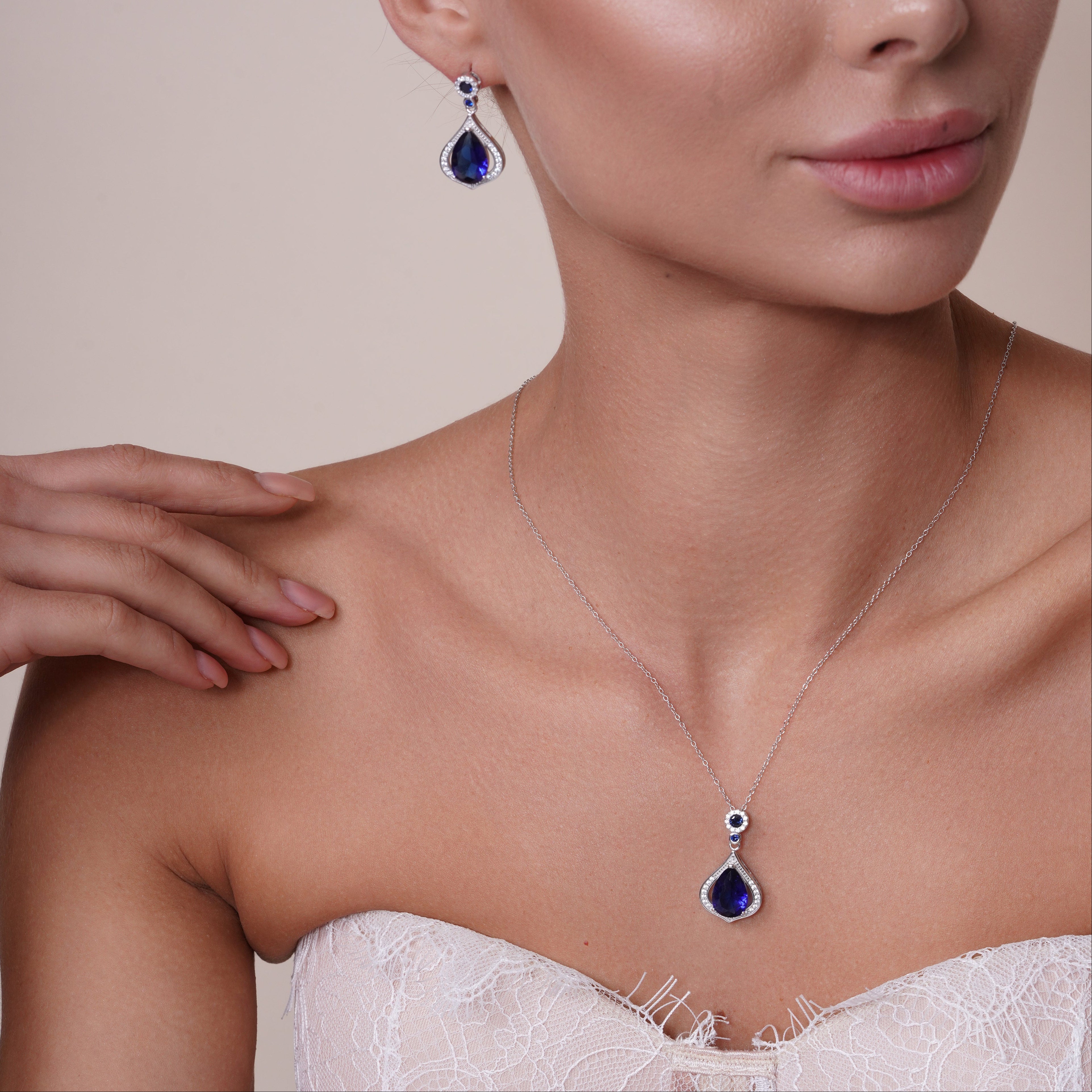 Juego de aretes colgantes y collar colgante con circonita cúbica en forma de lágrima transparente y azul bañada en rodio de plata 925 - BGS00440