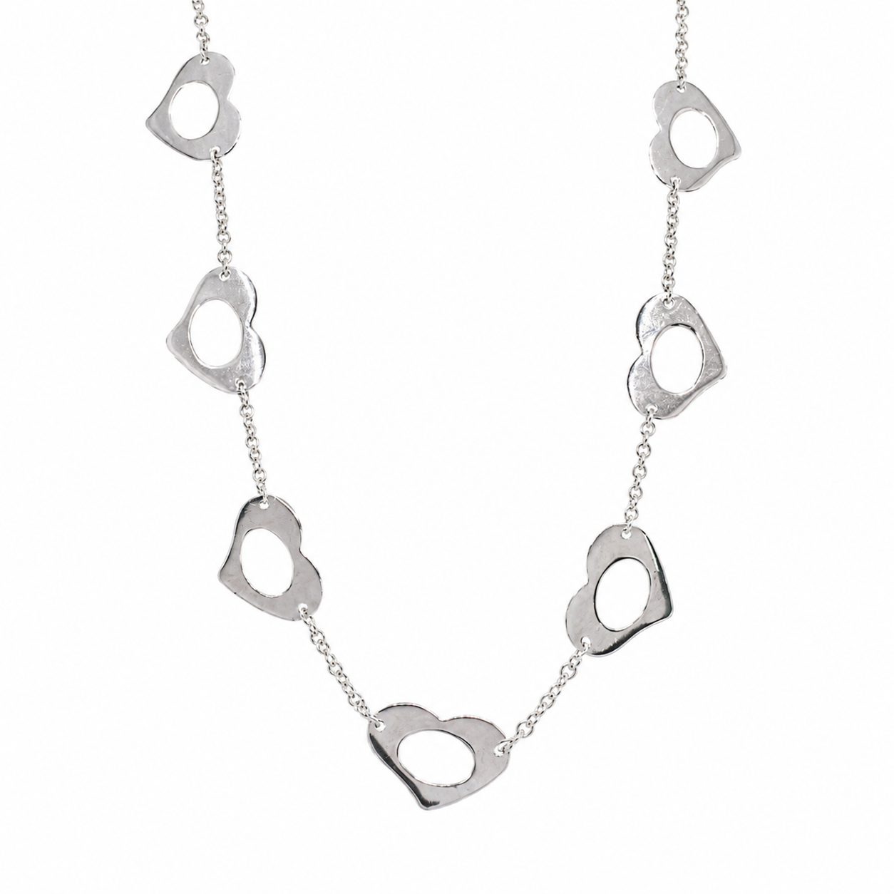 Collar con colgante de corazón abierto y baño de rodio en plata 925 (Liquidación) - BGN00020