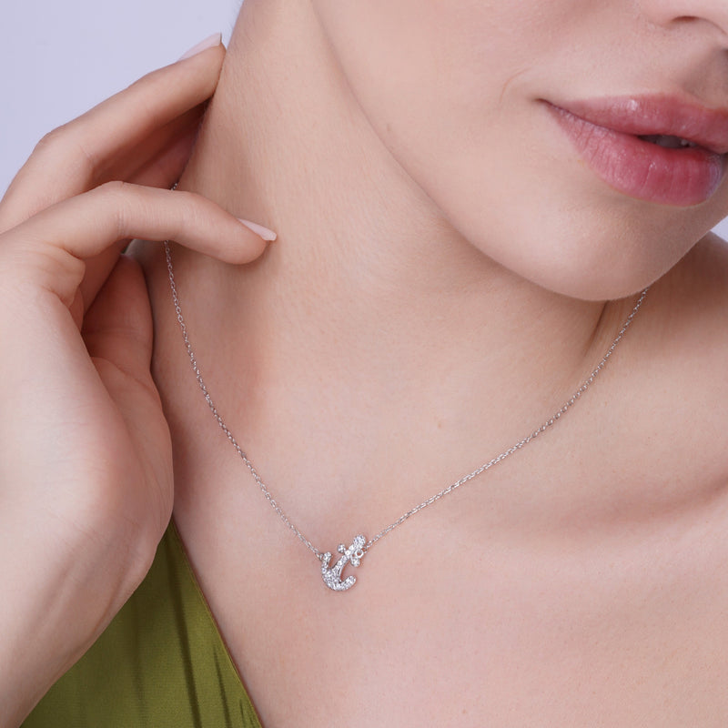 Juego de aretes y collar con circonita cúbica y ancla transparente chapado en rodio en plata 925 - BGS00307