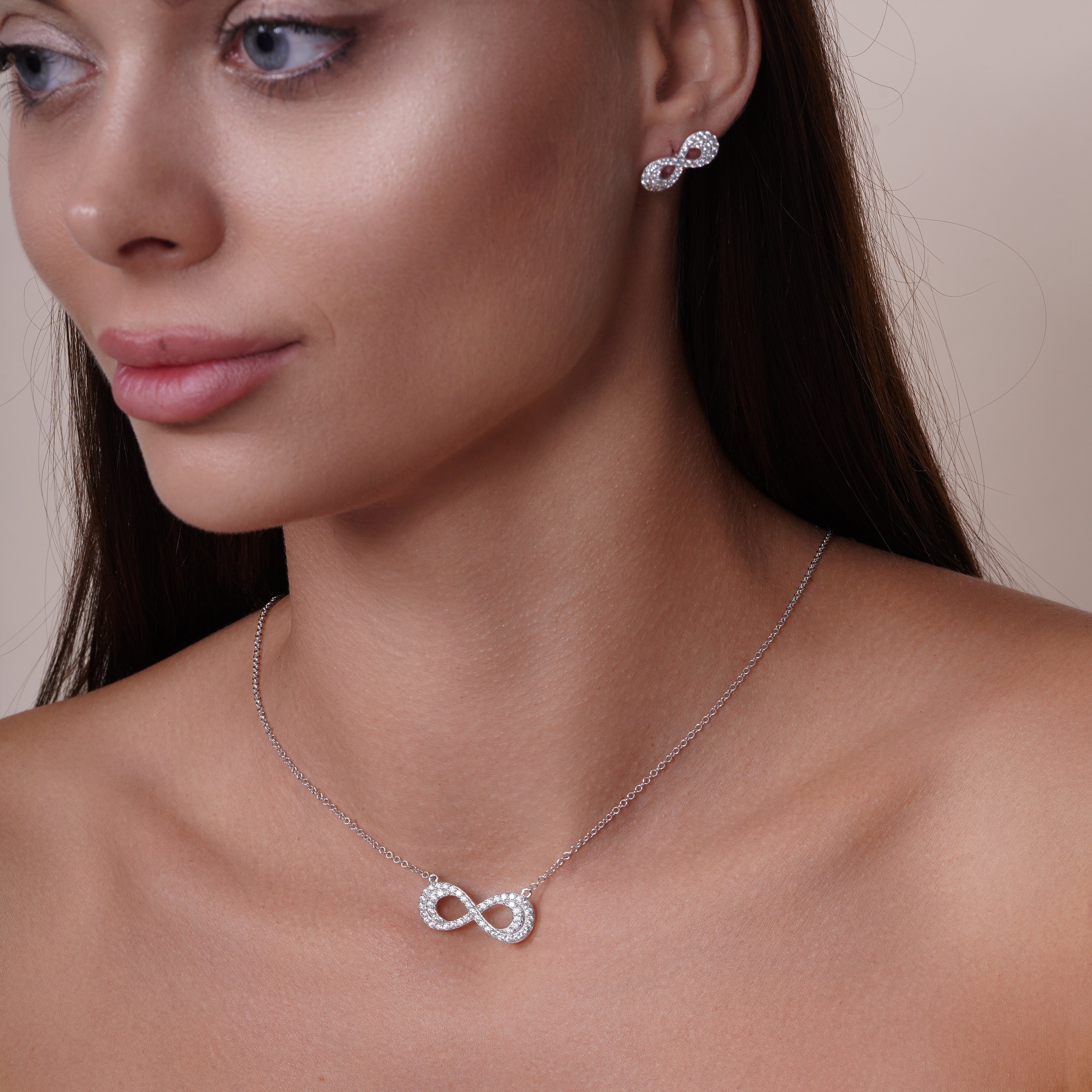 Juego de collar y aretes con circonita cúbica infinita de doble línea con incrustaciones transparentes chapadas en rodio en plata 925 - BGS00430