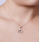 Conjunto de flores de plata de ley 925 con baño de rodio negro y oro rosa, acabado mate y circonita azul - BGS00514