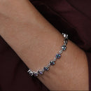 Rhodium Plated 925 Sterling Silver Synthetic Mystic Topaz Link Tennis Bracelet - BGB00328