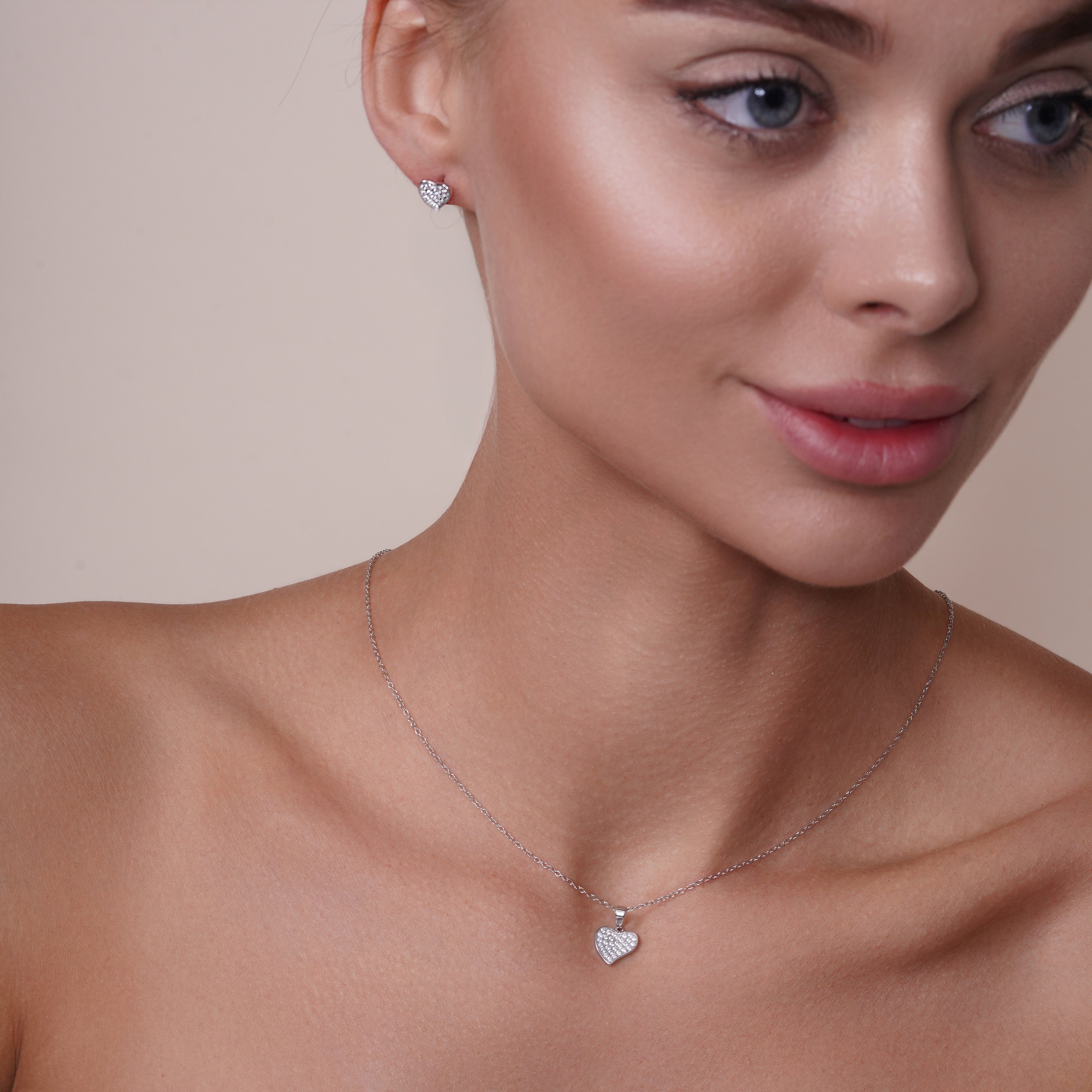 Rhodium Plated 925 Sterling Silver Curved Heart Necklace and Earring Set with Clear CZ Stones- BGS00611