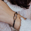 Black Rhodium Plated 925 Sterling Silver CZ Linked Loop Knot Bracelet - ECB00045BR