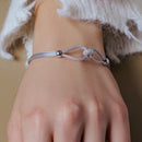 Pulsera de circonitas entrelazadas de plata de ley 925 rodiada - ECB00045RH