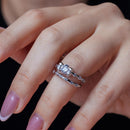 Anillo nupcial de plata de ley 925 rodiada con circonita cúbica transparente en el centro - BGR00403