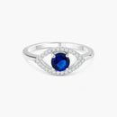 Rhodium Plated 925 Sterling Silver Open Evil Eye Ring with Blue Center Stones - BGR01360 | Silver Palace Inc.