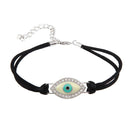 Silver 925 Rhodium Plated Small Evil Eye Clear CZ Black Cord Bracelet - STB00412 | Silver Palace Inc.