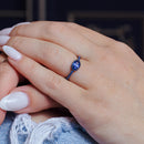 Anillo de plata de ley 925 con rodio negro y circonita azul ovalada - BGR01235