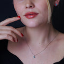 Halo de piedra central turquesa en rodio negro en plata de ley 925 - STS00537